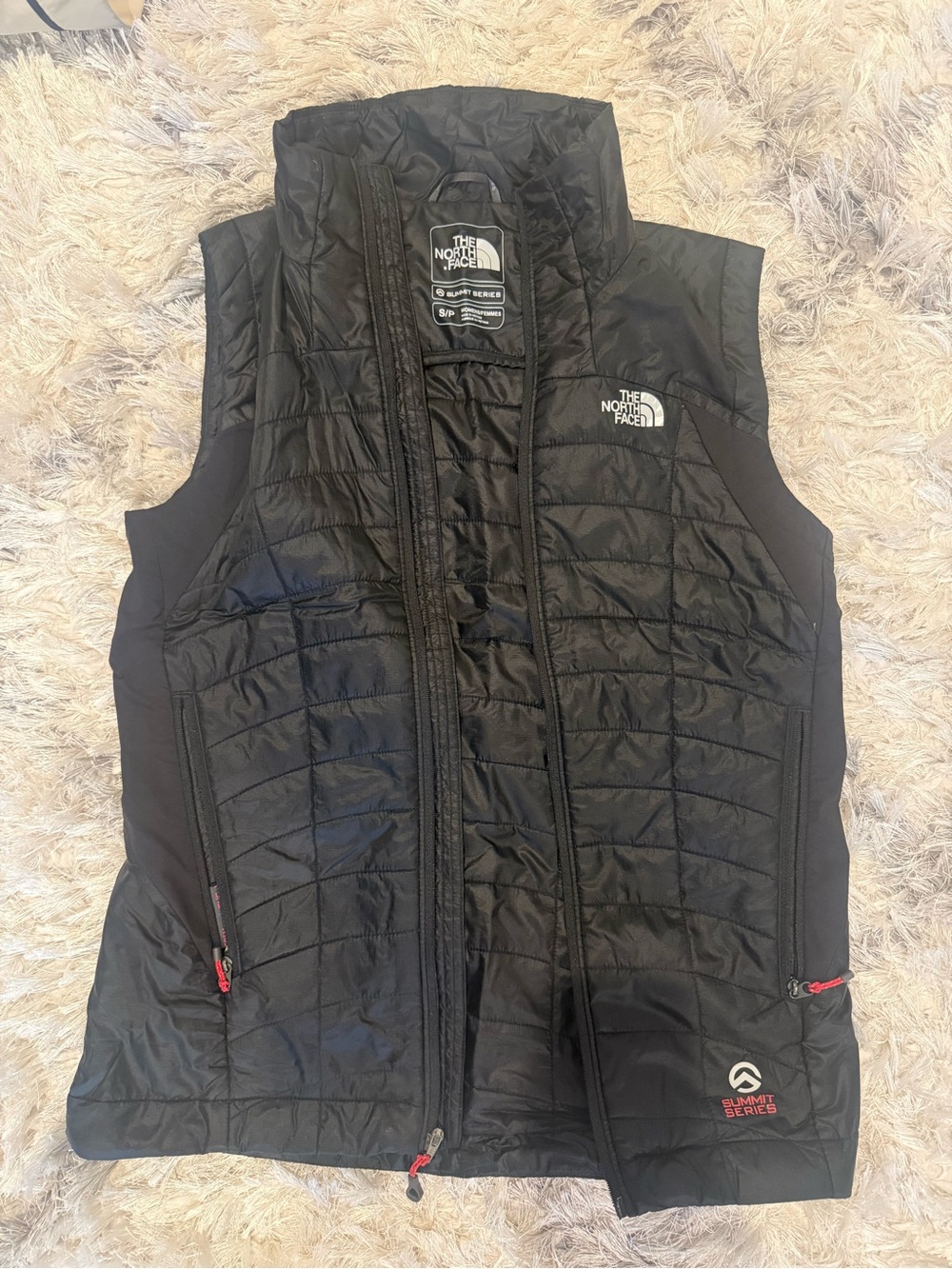 The North Face Black Quilted Insulated Vest with Summit Series Logo